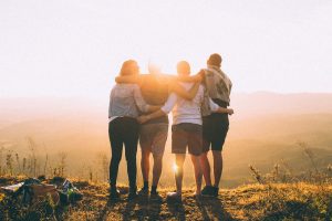 family-in-front-of-sun