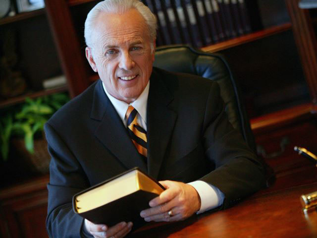 john-macarthur-in-office-holding-bible